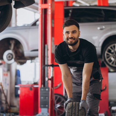 Independent garage workshop with car on lift